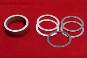 Ford 9" solid pinion bearing spacer kit.